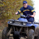 Image for article titled Guy Riding ATV Has Really Been Looking Forward To Breaking His Neck On Wooded Trail